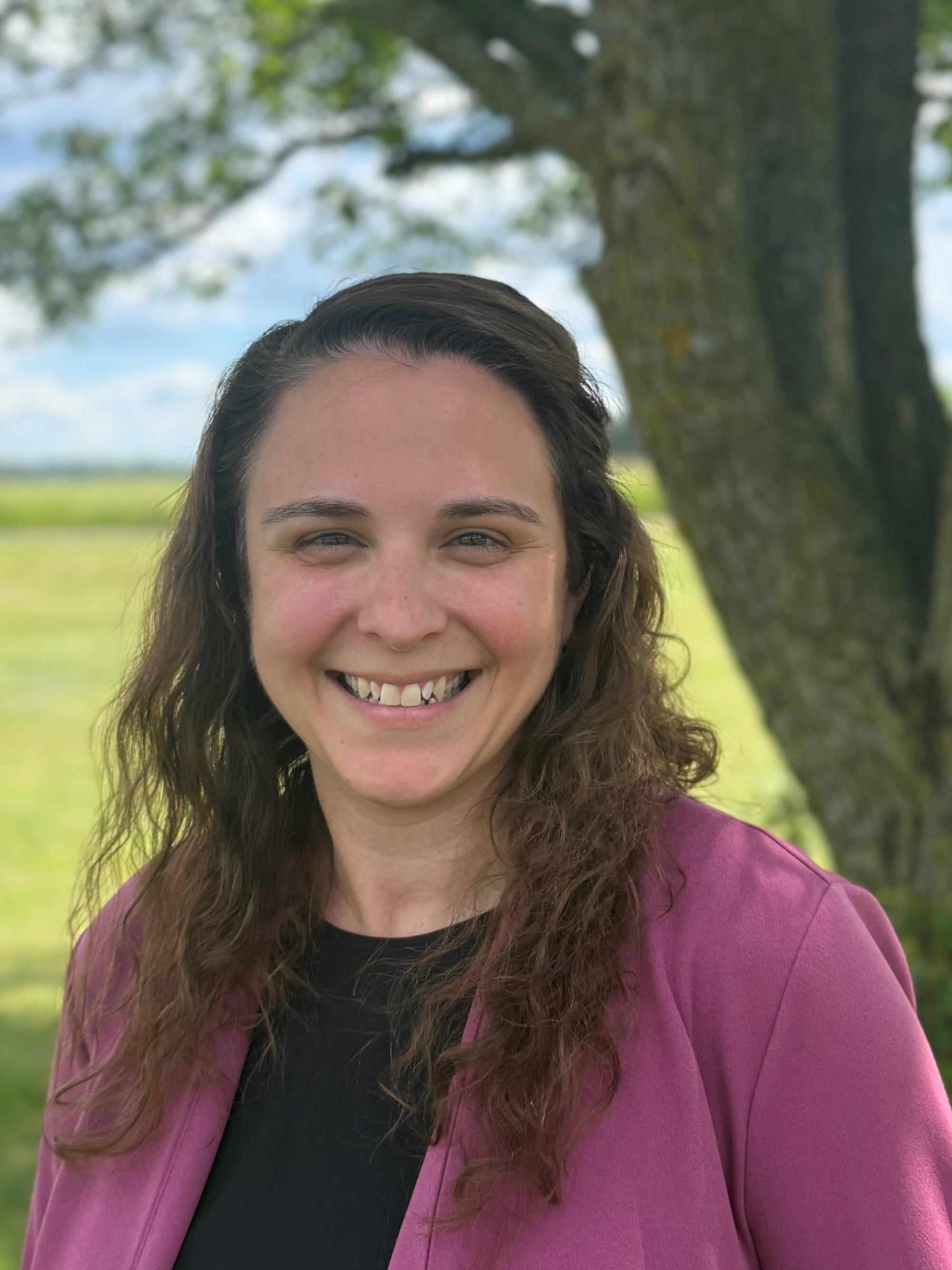 Professional headshot of Jessi Parker